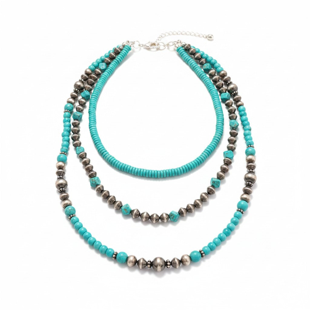 Doodlations Coffee Bar & Boutique layered statement necklace with turquoise beads and metallic accents
