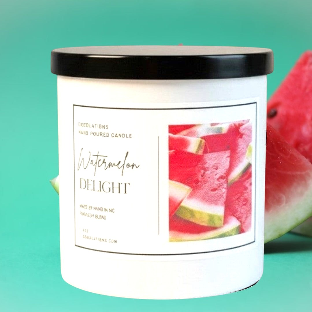 Doodlations Coffee Bar & Boutique Watermelon Delight hand-poured soy blend candle with a black lid.