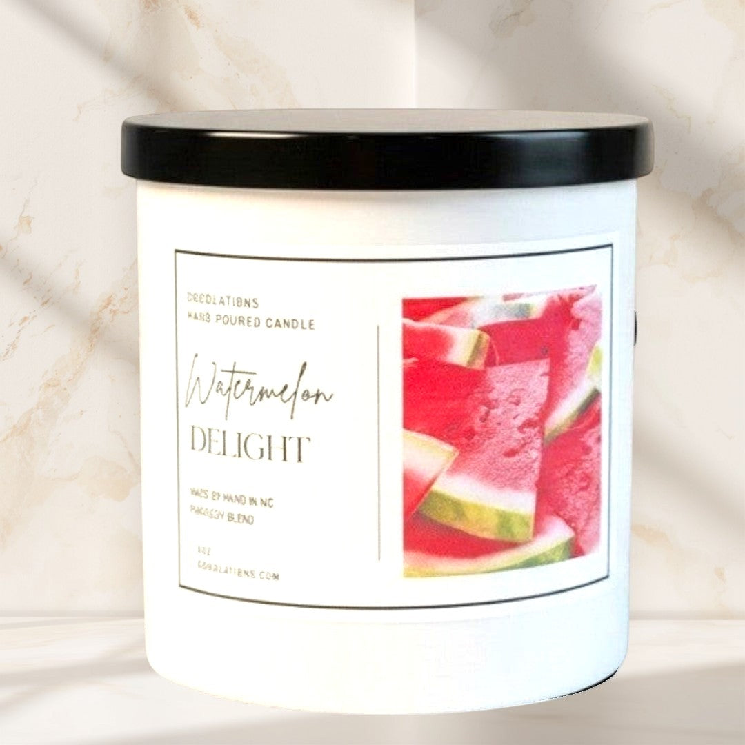 Doodlations Coffee Bar & Boutique Watermelon Delight hand-poured soy blend candle with black lid.
