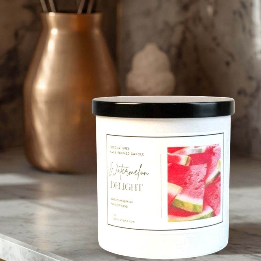 Doodlations Coffee Bar & Boutique Watermelon Delight hand-poured soy blend candle with black lid.