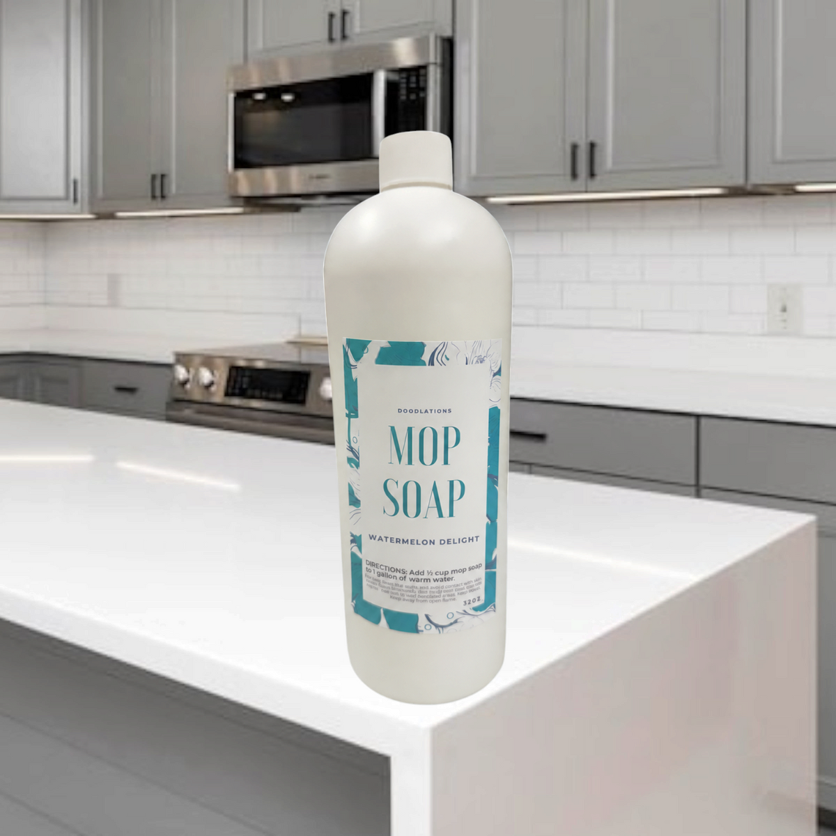 Doodlations Coffee Bar & Boutique 32 oz concentrated watermelon delight mop soap bottle on a marble counter