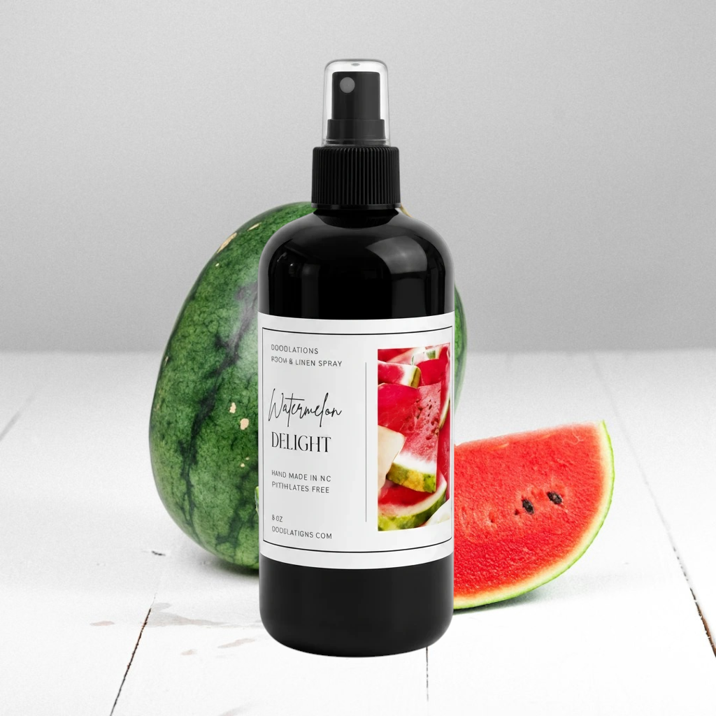 Doodlations Coffee Bar & Boutique Watermelon Delight room and linen spray in a black bottle with a fruit label