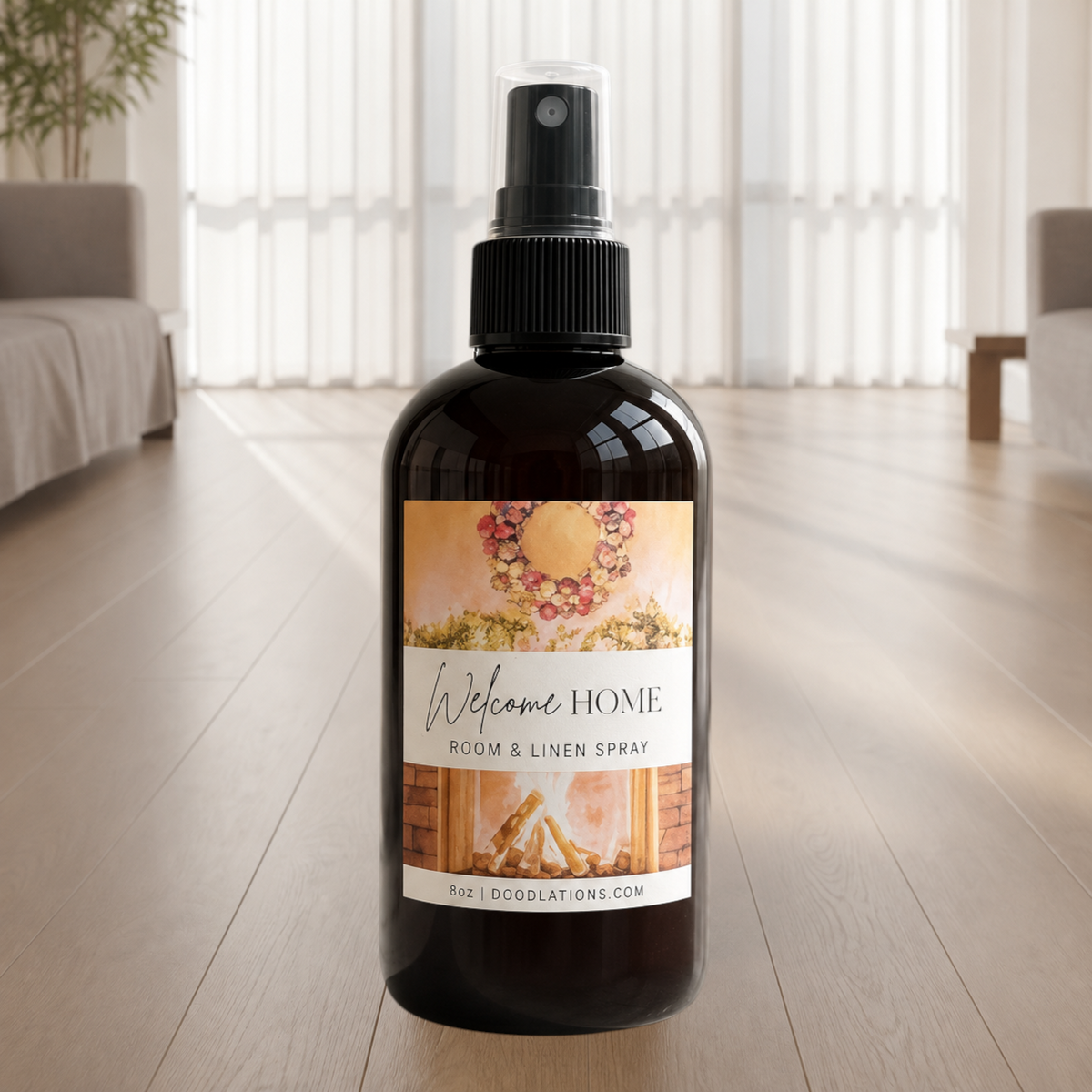 Doodlations Coffee Bar & Boutique Welcome Home room and linen spray in an amber glass bottle with a black spray nozzle.