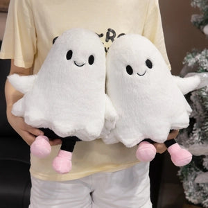 Doodlations Coffee Bar & Boutique pair of soft white plush ghost toys with friendly embroidered faces and pink feet