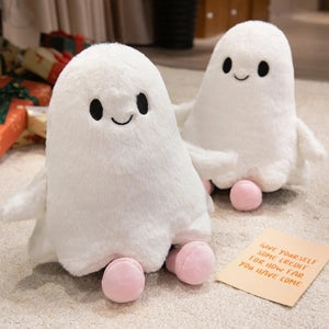 Doodlations Coffee Bar & Boutique white plush ghost stuffed animal toys with friendly embroidered faces and pink feet
