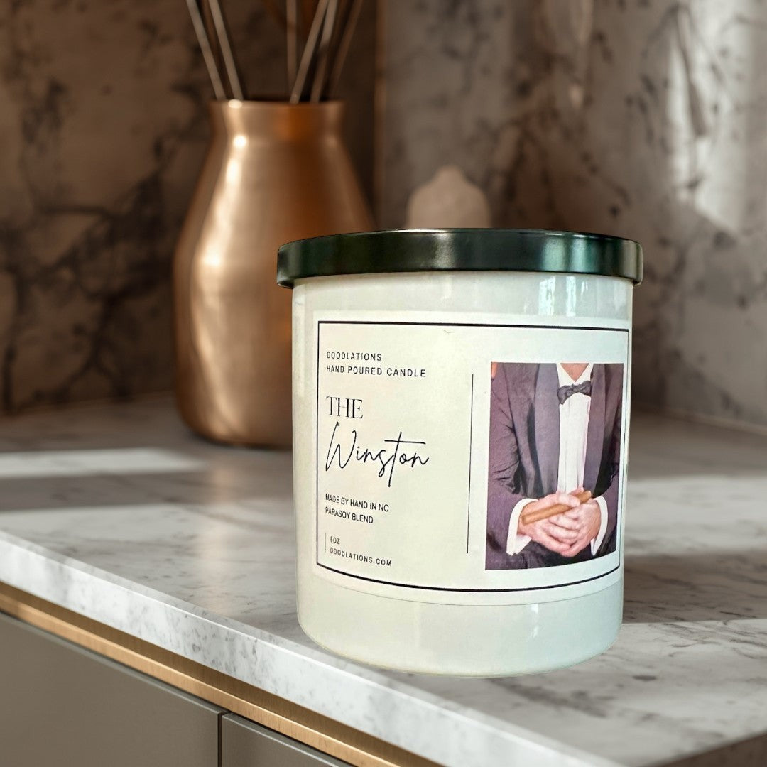 Doodlations Coffee Bar & Boutique The Winston hand-poured soy blend candle with sweet tobacco, honey, amaretto, and oak notes.