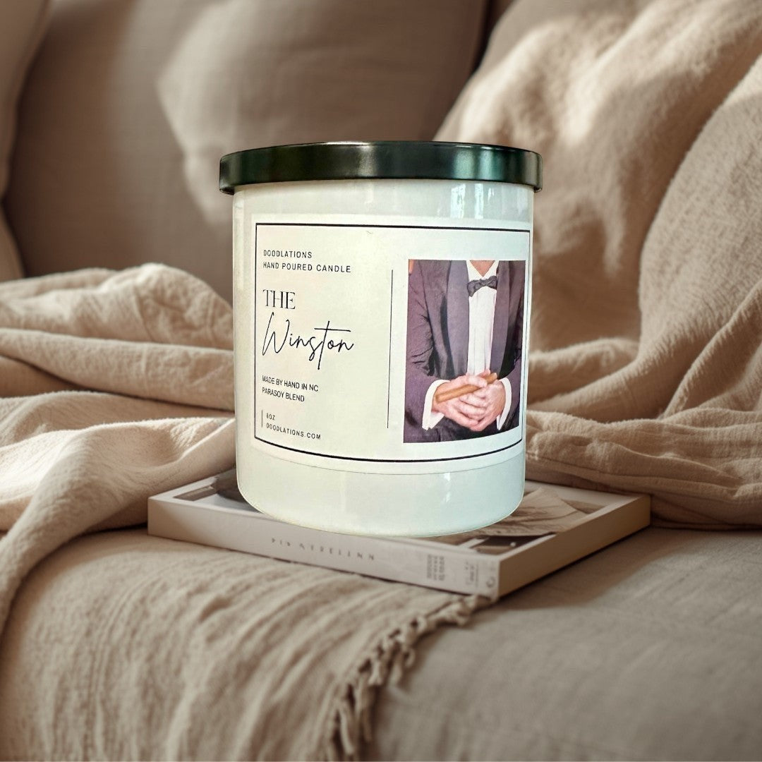 Doodlations Coffee Bar & Boutique The Winston hand-poured candle with sweet tobacco, honey, amaretto, and oak notes.