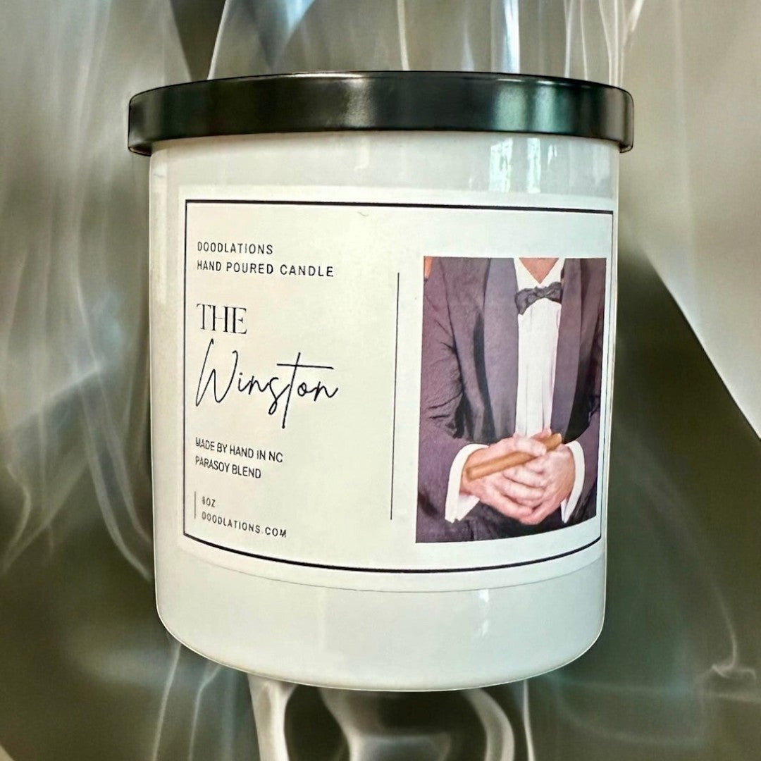 Doodlations Coffee Bar & Boutique The Winston hand-poured candle with tobacco, honey, amaretto, and oak notes.