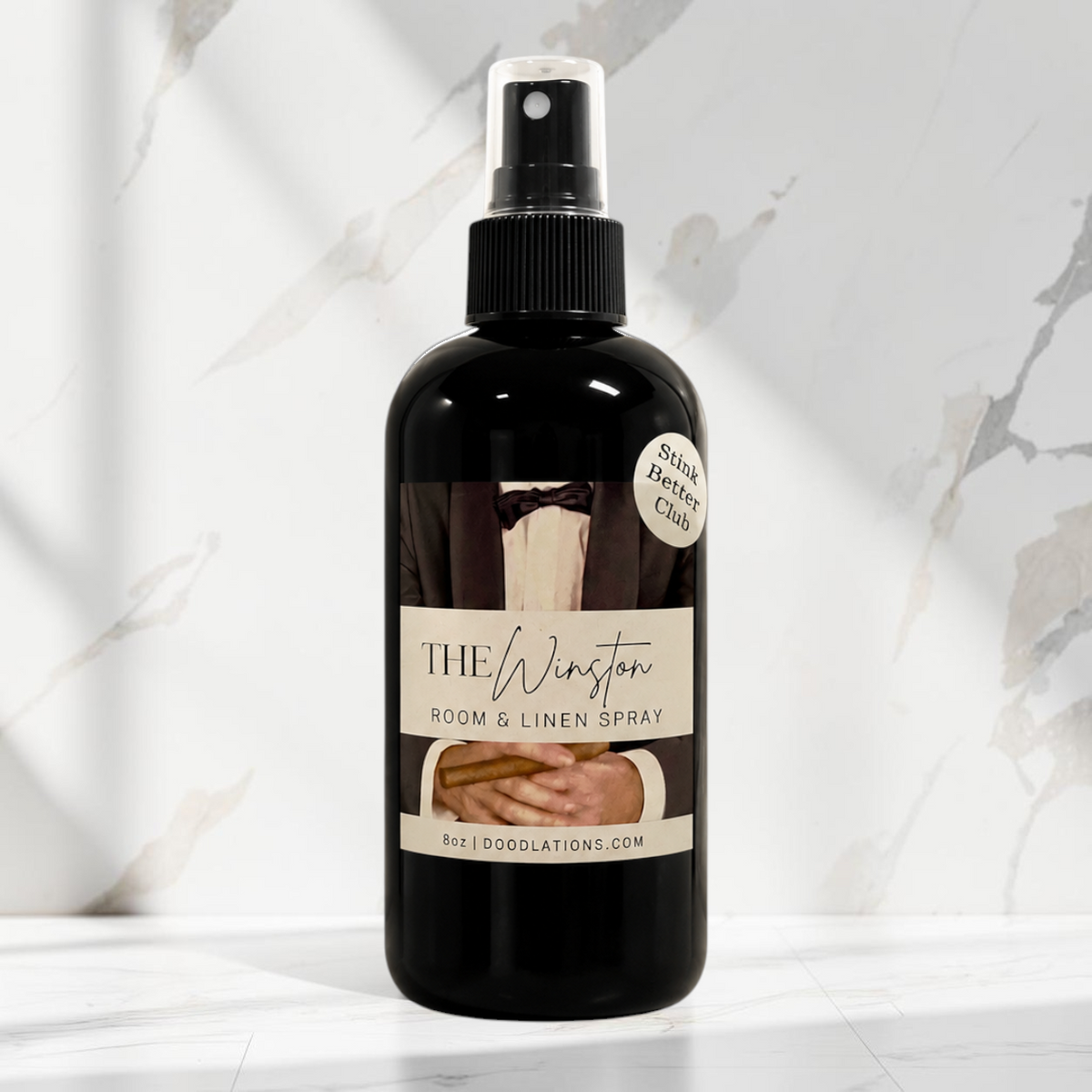 Doodlations Coffee Bar & Boutique The Winston room and linen spray in a black bottle with a sophisticated label.