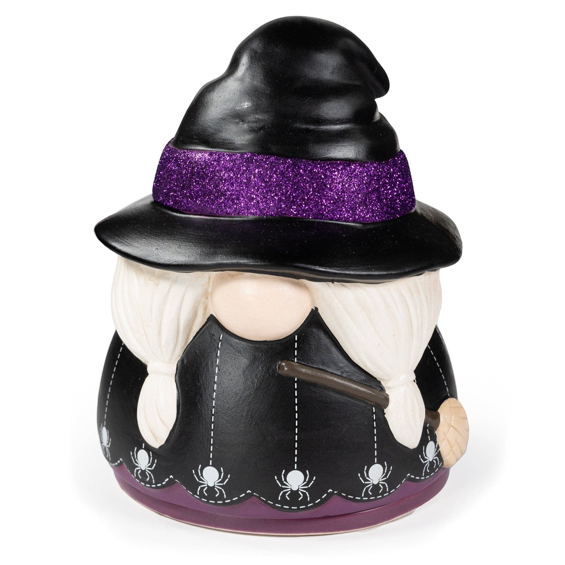 Doodlations Coffee Bar & Boutique ceramic witch gnome wax warmer with a purple glitter hat and spider web base.
