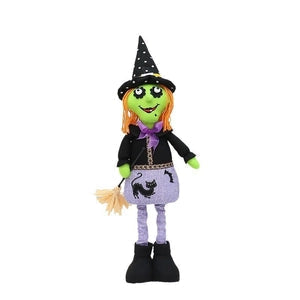 Doodlations Coffee Bar & Boutique fabric witch plush doll with orange hair, polka dot hat, and black cat skirt.