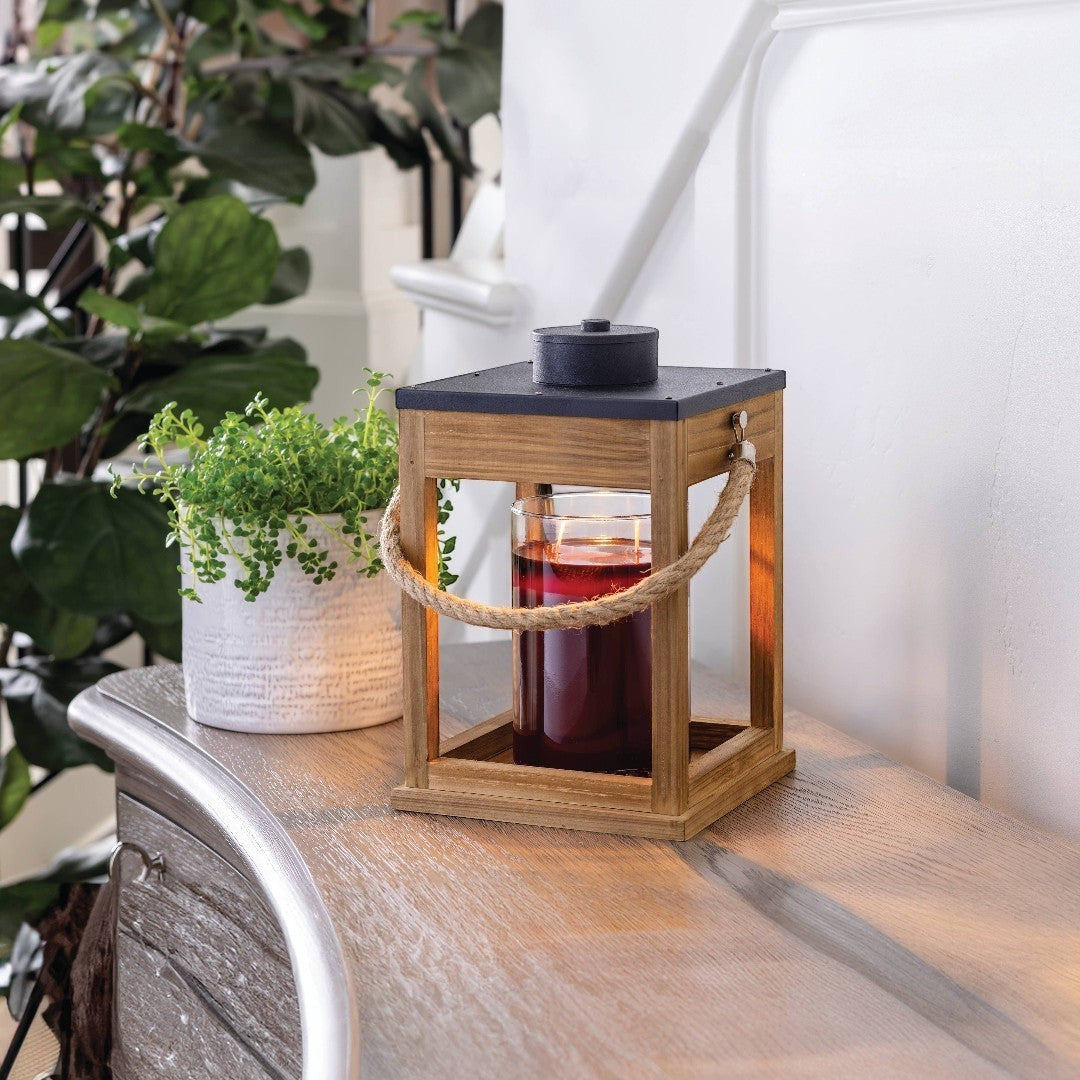 Doodlations Wood & Rope Candle Warmer Lantern with a red candle inside, featuring rustic wood and rope accents.