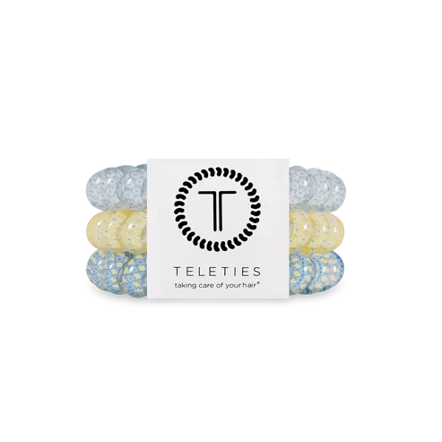 Doodlations Coffee Bar & Boutique Ciao Bella hair ties in a pack of three with yellow and blue floral patterns.