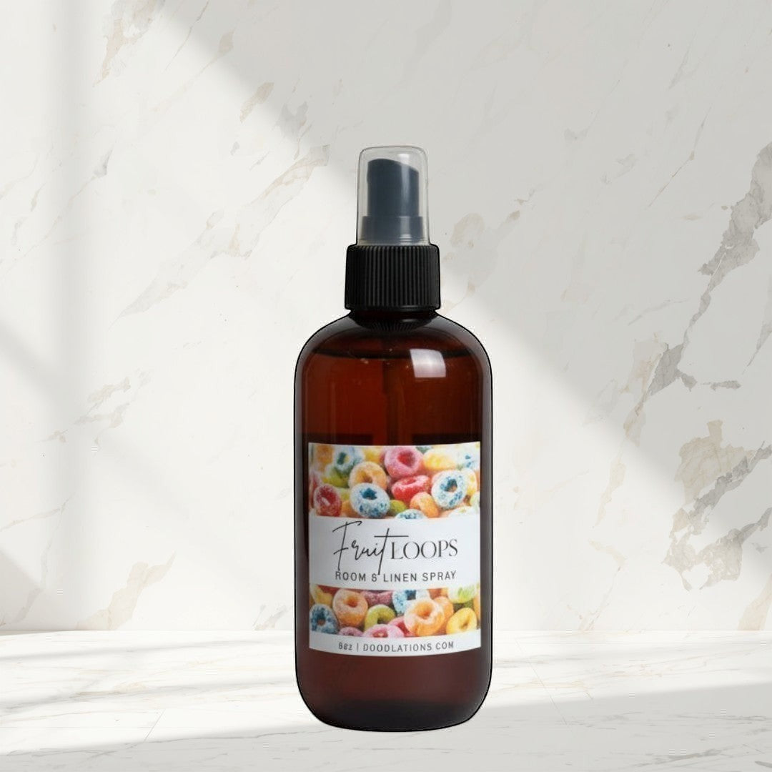 Doodlations Coffee Bar & Boutique Fruit Loops room and linen spray in amber bottle with colorful cereal label.