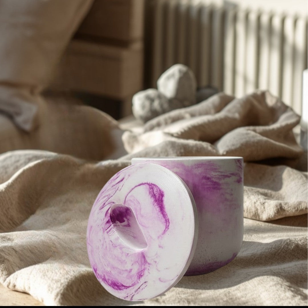 Doodlations Coffee Bar & Boutique luxury hand-poured concrete vessel candle with pink and white marbling. Reusable vessel.