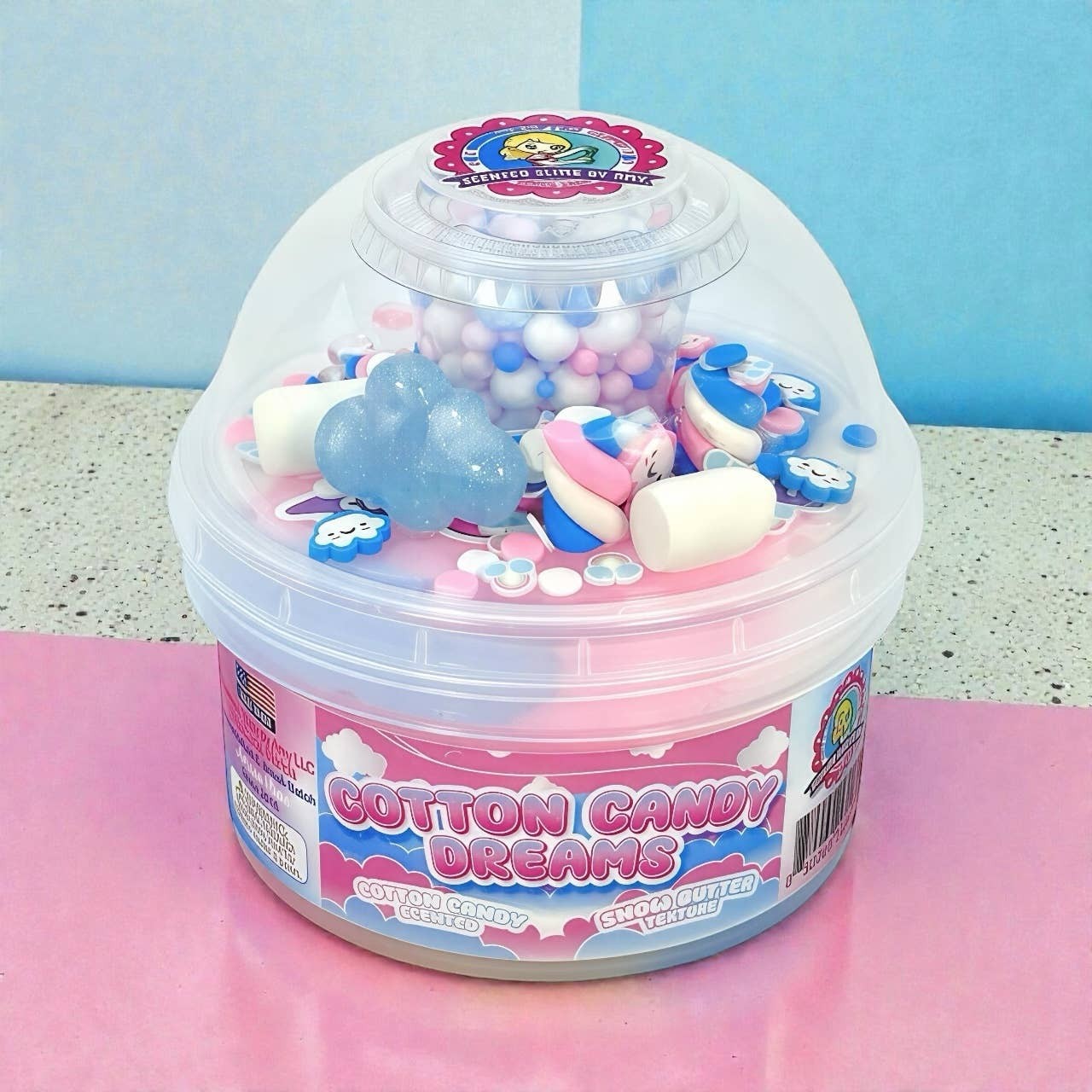 Doodlations Cotton Candy Dreams Snow Slime with cloud charms, pastel beads, and marshmallow accents.