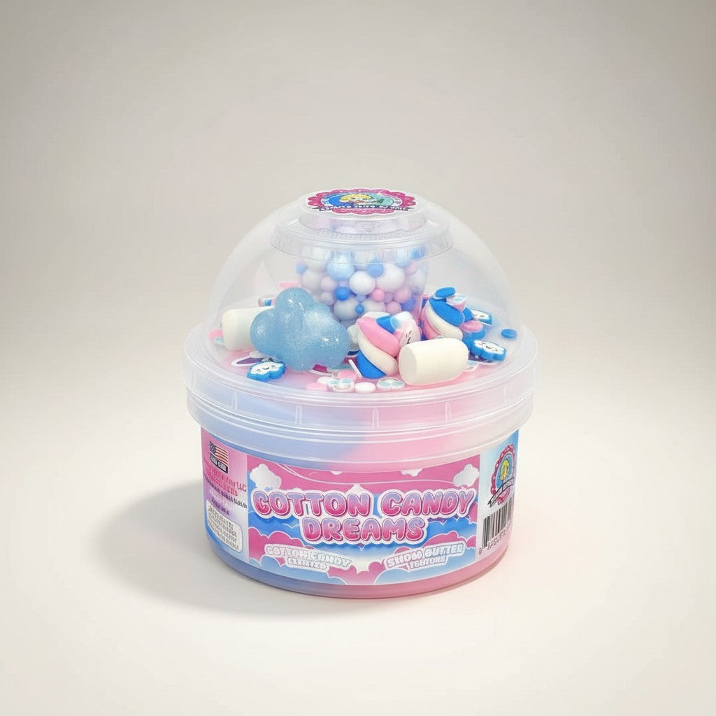 Doodlations Cotton Candy Dreams snow butter slime swirled pink, blue, white with charms and floam.