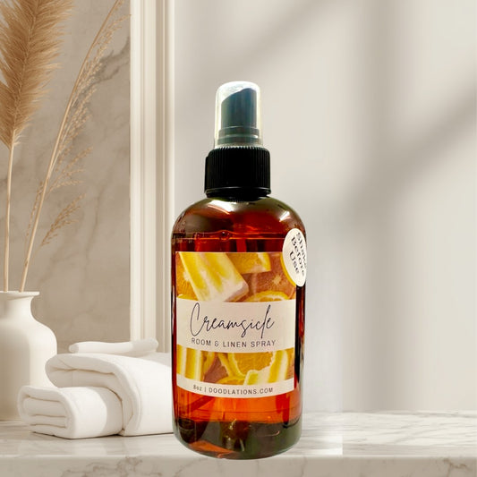 Doodlations Coffee Bar & Boutique Creamsicle Room & Linen Spray with citrus design. 8oz bottle.