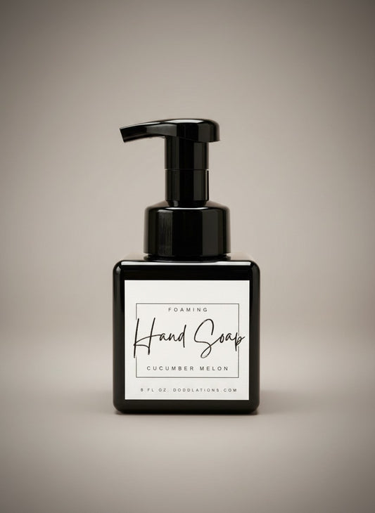 Doodlations Coffee Bar & Boutique black foaming hand soap dispenser with Cucumber Melon scent.