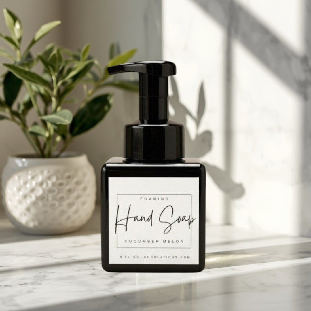 Doodlations Coffee Bar & Boutique black foaming hand soap dispenser with Cucumber Melon scent.