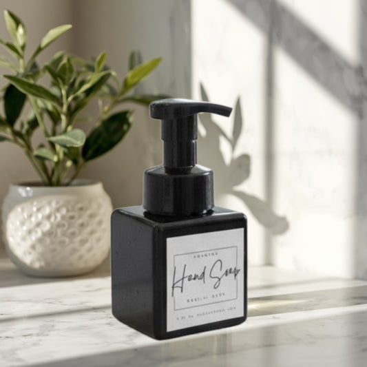 Doodlations Coffee Bar & Boutique Darlin Days foaming hand soap in a black square bottle with a black pump dispenser.