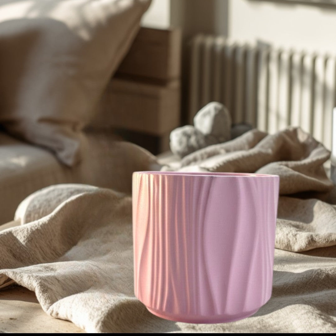 Doodlations Darlin’ Days pink marbled concrete candle vessel with vertical wave pattern.