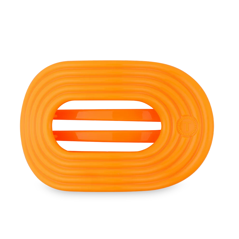 Doodlations Coffee Bar & Boutique orange flat round hair clip with striped interior for sectioning hair.