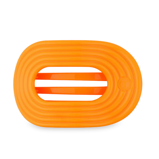 Doodlations Coffee Bar & Boutique orange flat round hair clip with striped interior for sectioning hair.