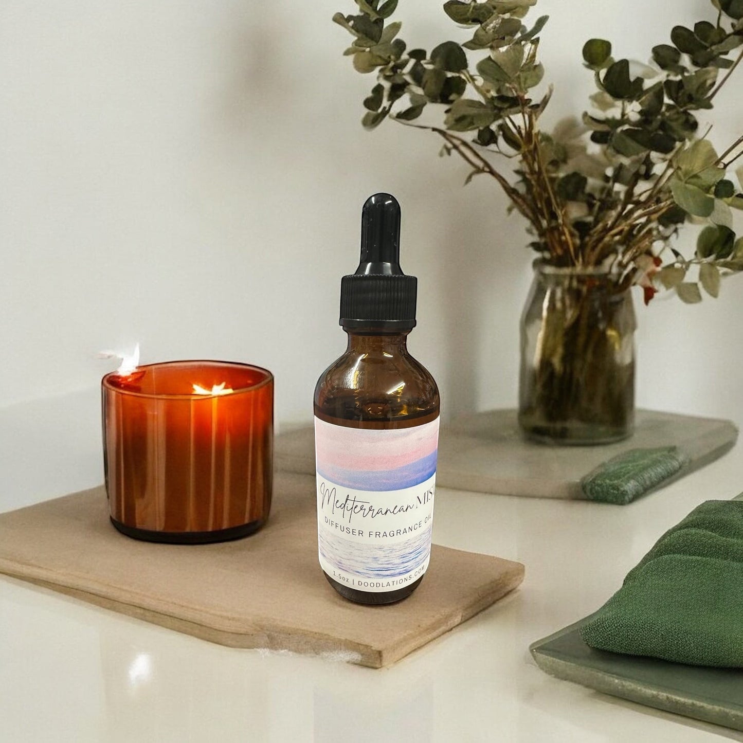 Doodlations Coffee Bar & Boutique Mediterranean Vibes diffuser fragrance oil in amber glass bottle with dropper.