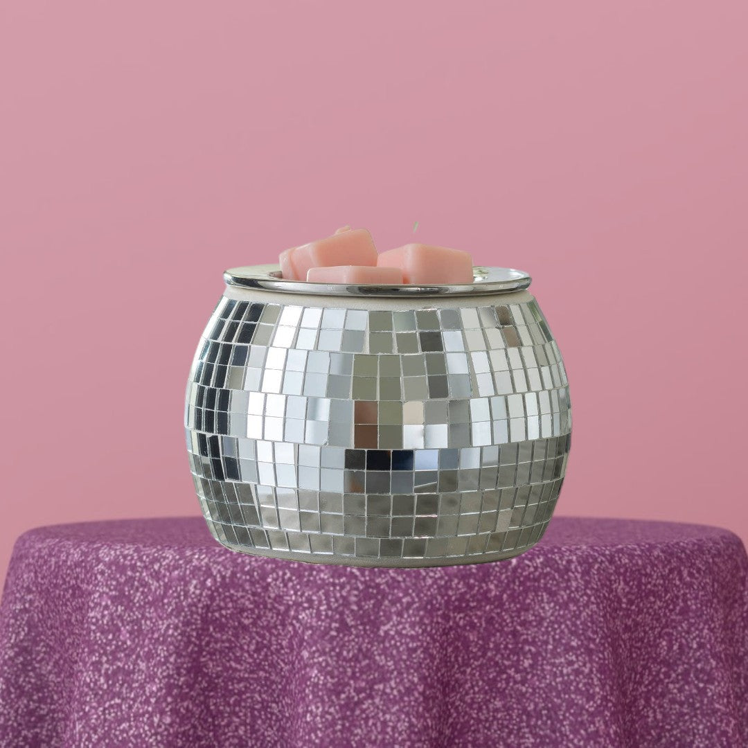 Doodlations Disco Ball Fragrance Warmer with pink wax melts in a silver mirrored mosaic finish.