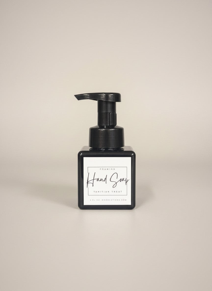 Doodlations Coffee Bar & Boutique Tahitian Treat foaming hand soap in a black square bottle with a black pump.