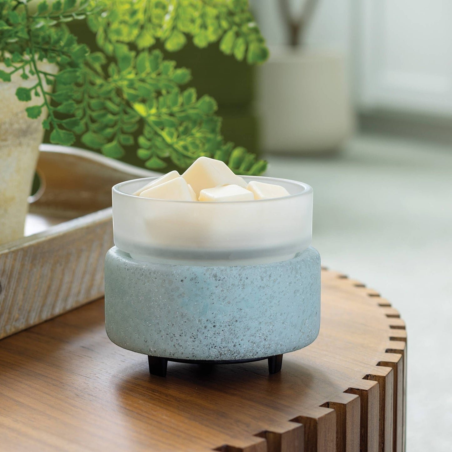 Doodlations Coffee Bar & Boutique Frosted Glass Wax Warmer with textured blue-green base and frosted dish filled with wax melts.