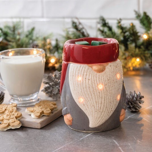 Doodlations Coffee Bar & Boutique gnome wax warmer with red hat, grey coat, and textured white beard with glowing lights.