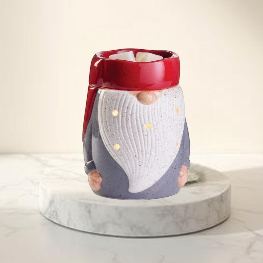 Doodlations Coffee Bar & Boutique gnome wax warmer in grey with red hat, white beard and illuminated dots.