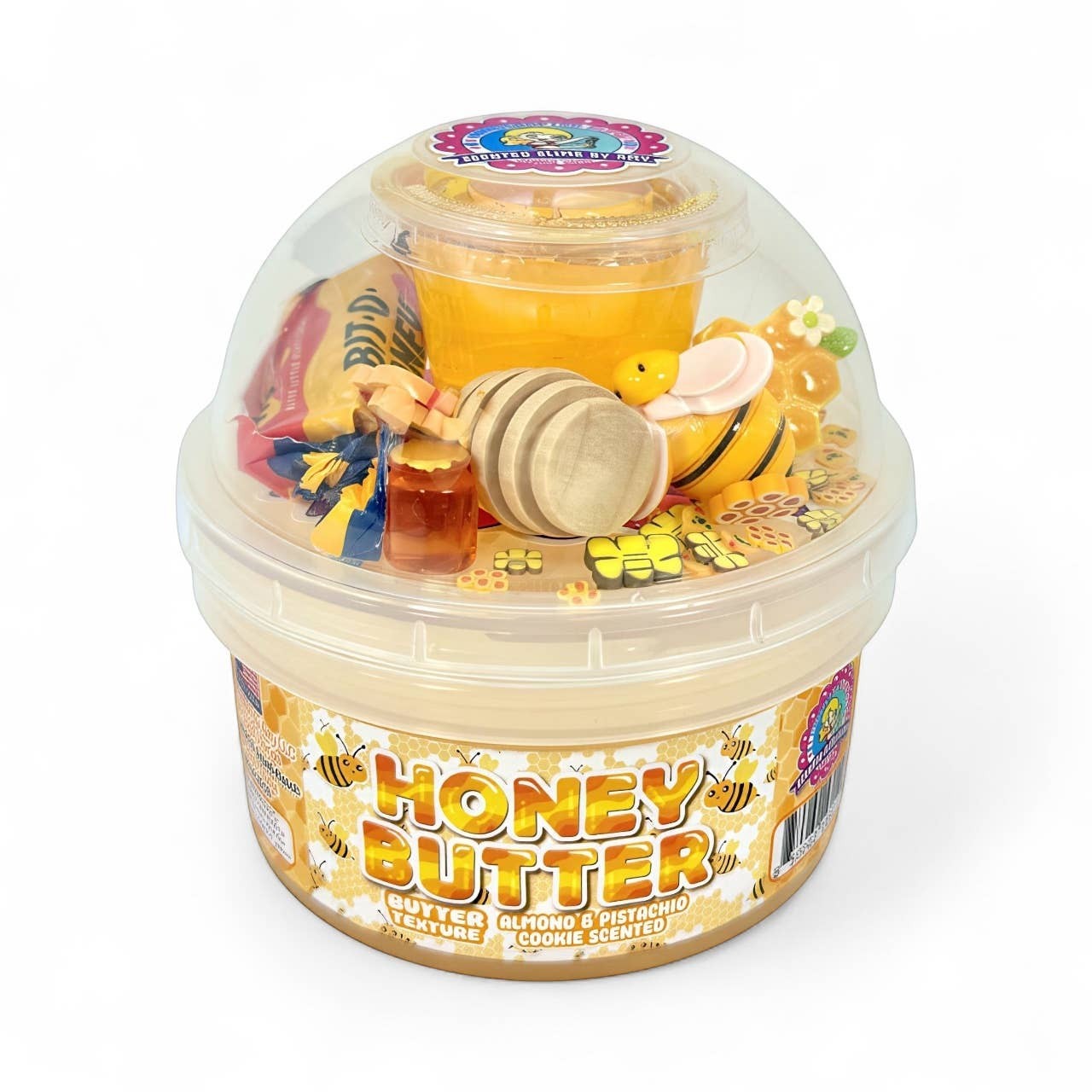 Doodlations Honey Butter Cookie Scented Slime with bee charm, honey dipper, and mini honey jar.