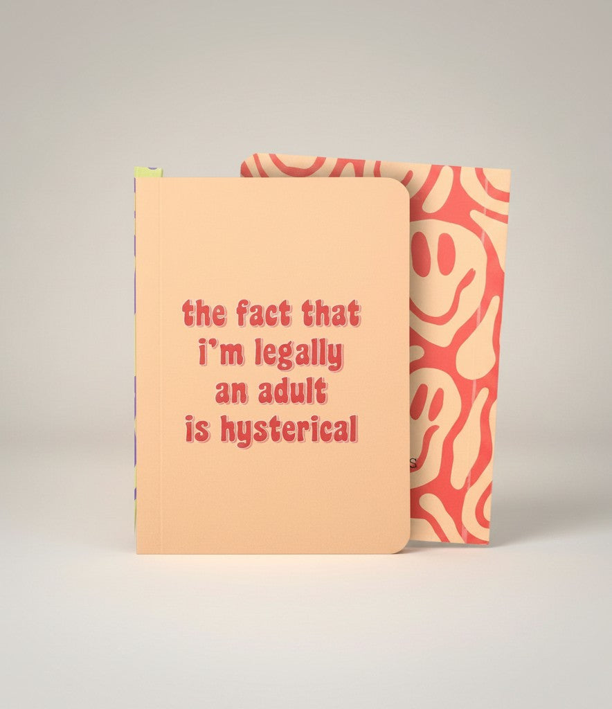 Doodlations Coffee Bar & Boutique peach notebook with red text that reads "the fact that i'm legally an adult is hysterical".