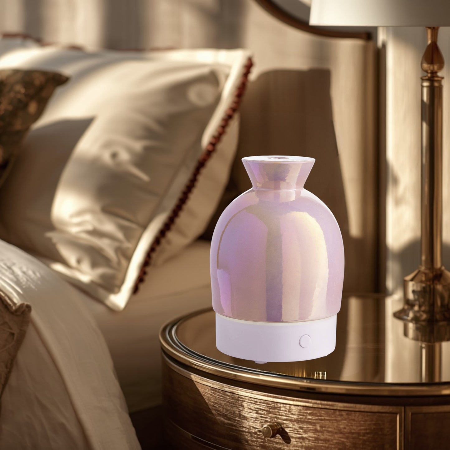 Doodlations iridescent water droplet aroma diffuser with pearlescent finish and white base. Essential oil diffuser & humidifier.