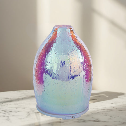 Doodlations iridescent water droplet textured glass aroma diffuser with soothing mist.