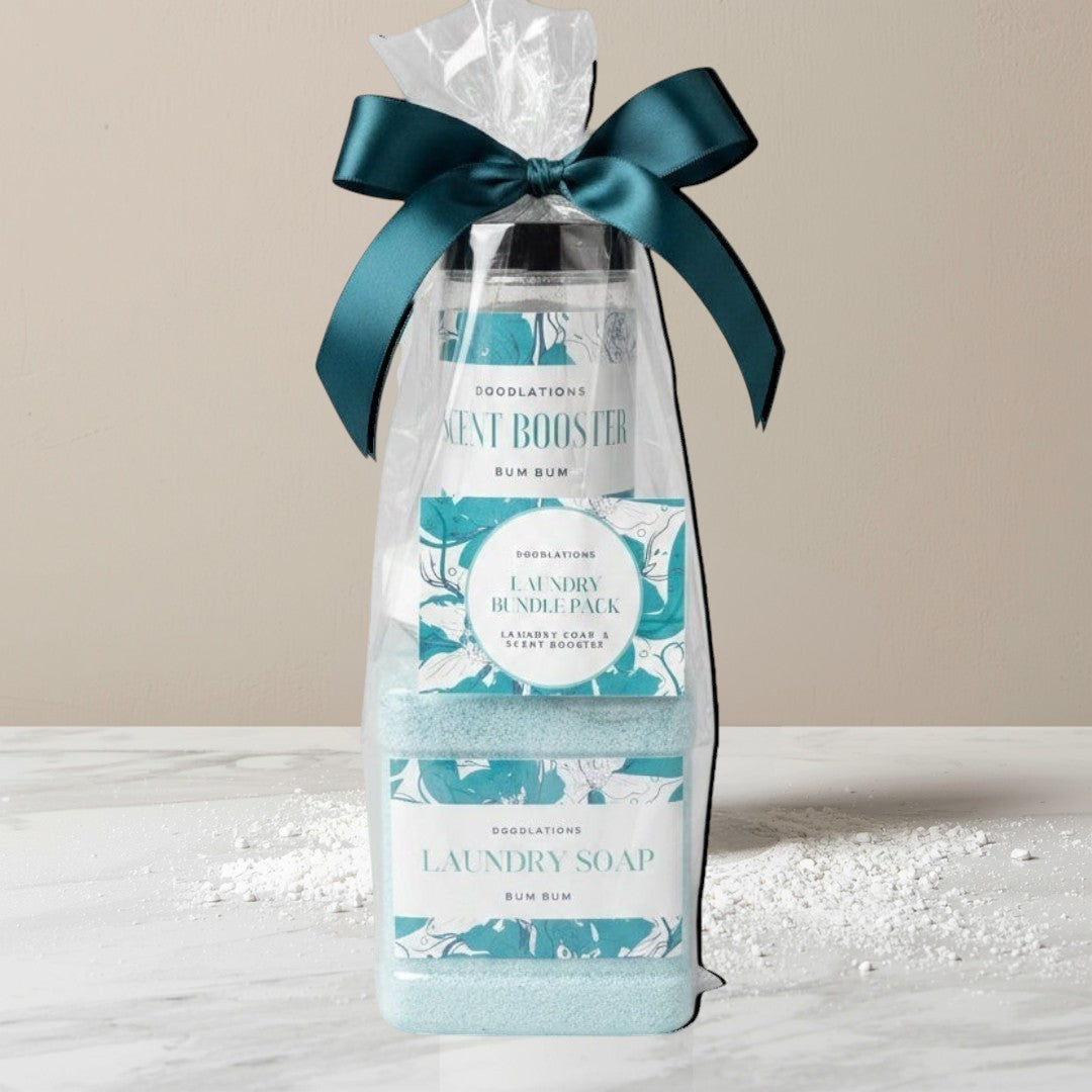 Doodlations Laundry Bundle with powdered detergent and scent booster in blue packaging with teal ribbon.