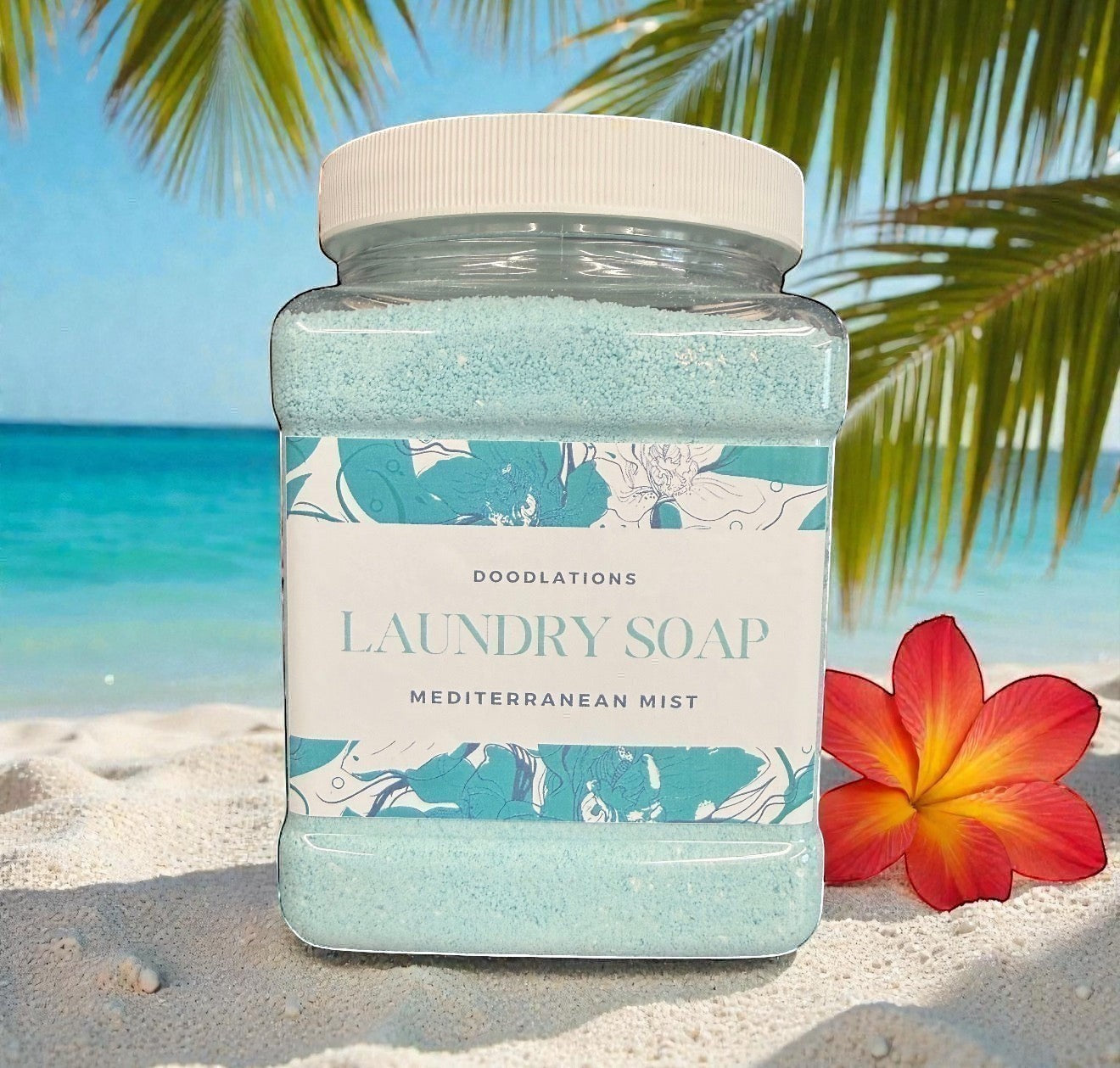 Mediterranean Mist scent Doodlations Powder Laundry Detergent in Mediterranean Mist scent, light blue granules in a clear plastic jar with a white lid.