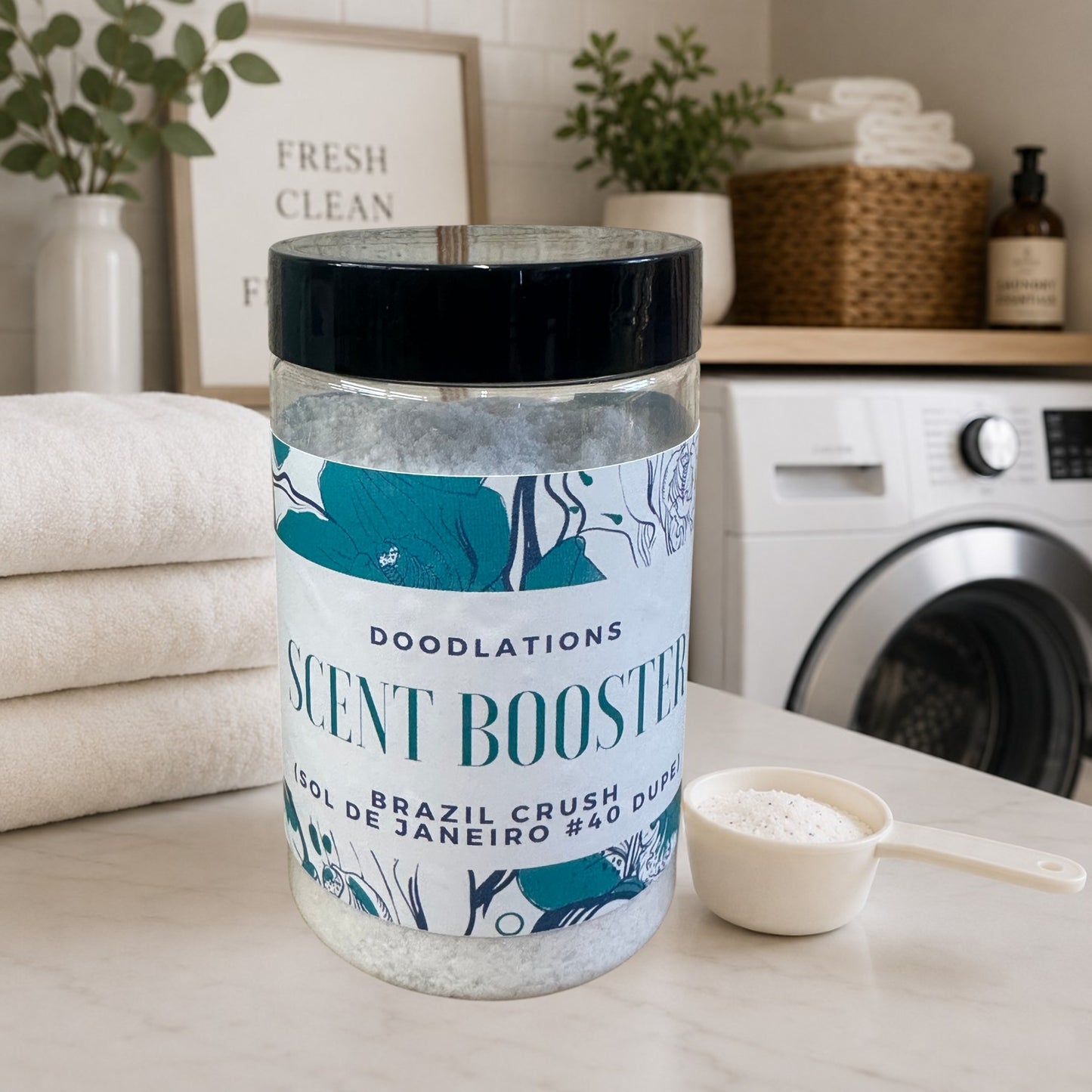 Doodlations Laundry Scent Booster in Brazilian Crush scent, a clear jar filled with white granules and a floral label.