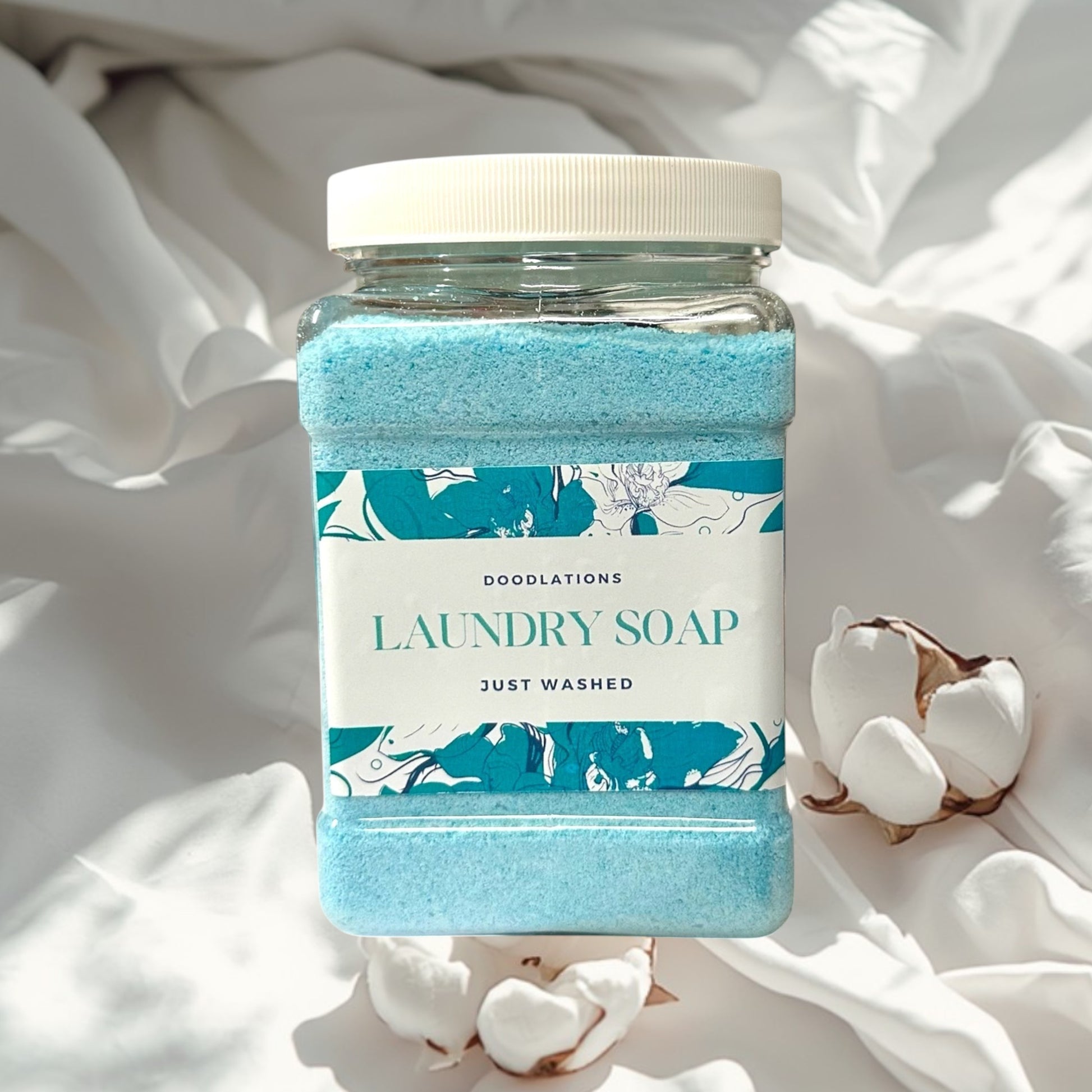 Doodlations Laundry Scent Booster in Just Washed scent, a bright blue granular product in a clear plastic jar with a white lid.