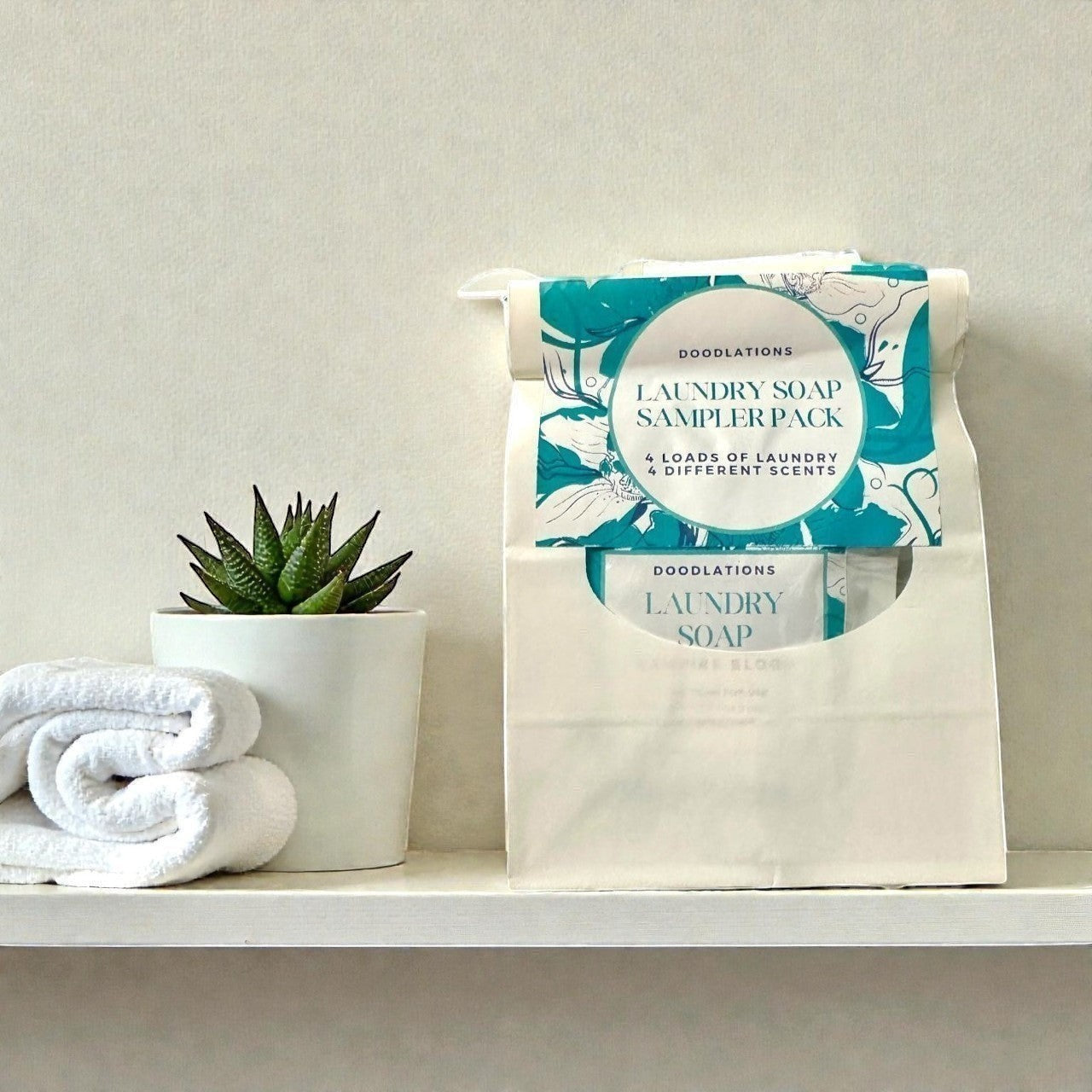 Doodlations Laundry Soap Sampler Pack with 4 different scents. Includes 4 loads of laundry.