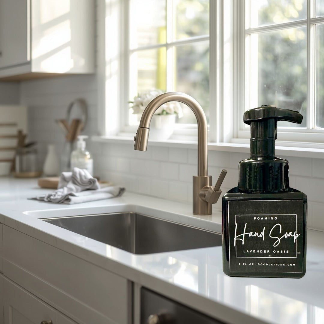 Doodlations Lavender Oasis foaming hand soap in a black bottle with a white label. 8 fl oz.