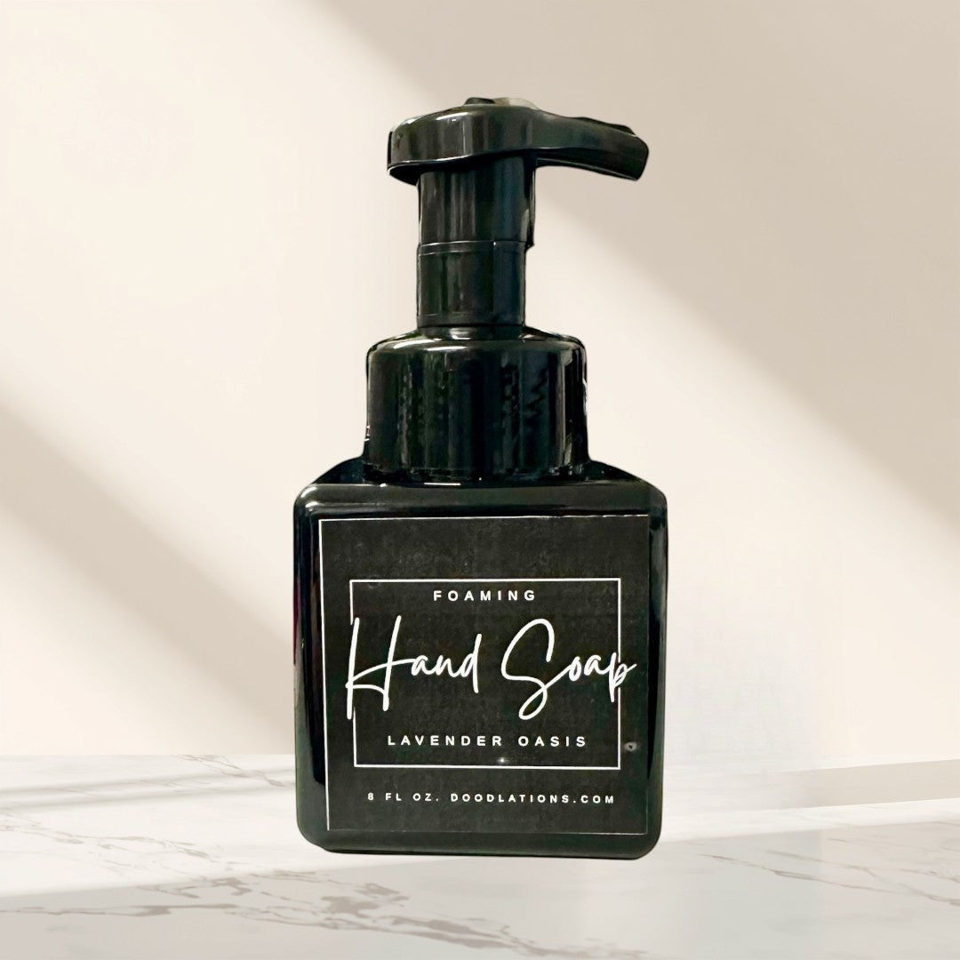 Doodlations Lavender Oasis foaming hand soap in a black square bottle with a white label. 8 fl oz.