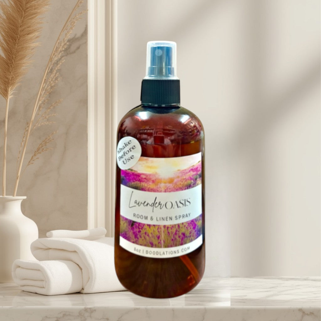 Doodlations Coffee Bar & Boutique Lavender Oasis room and linen spray in a brown bottle with a scenic label.