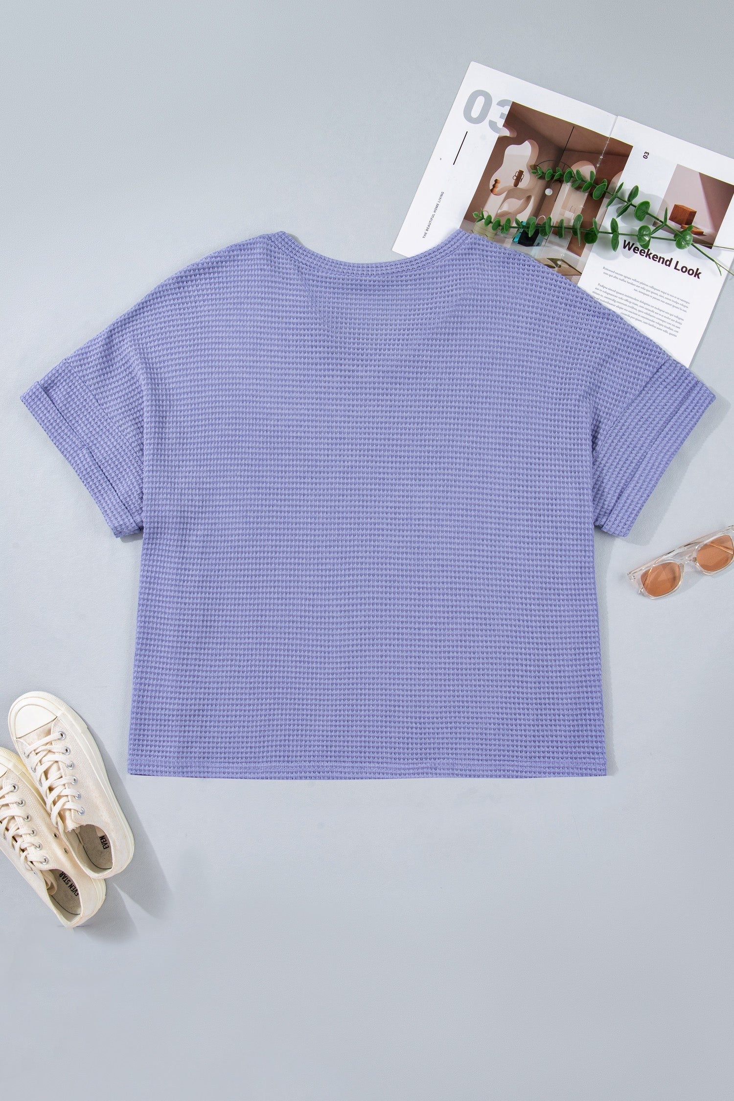 Doodlations Coffee Bar & Boutique lavender waffle knit v-neck short sleeve top with cuffed sleeves.
