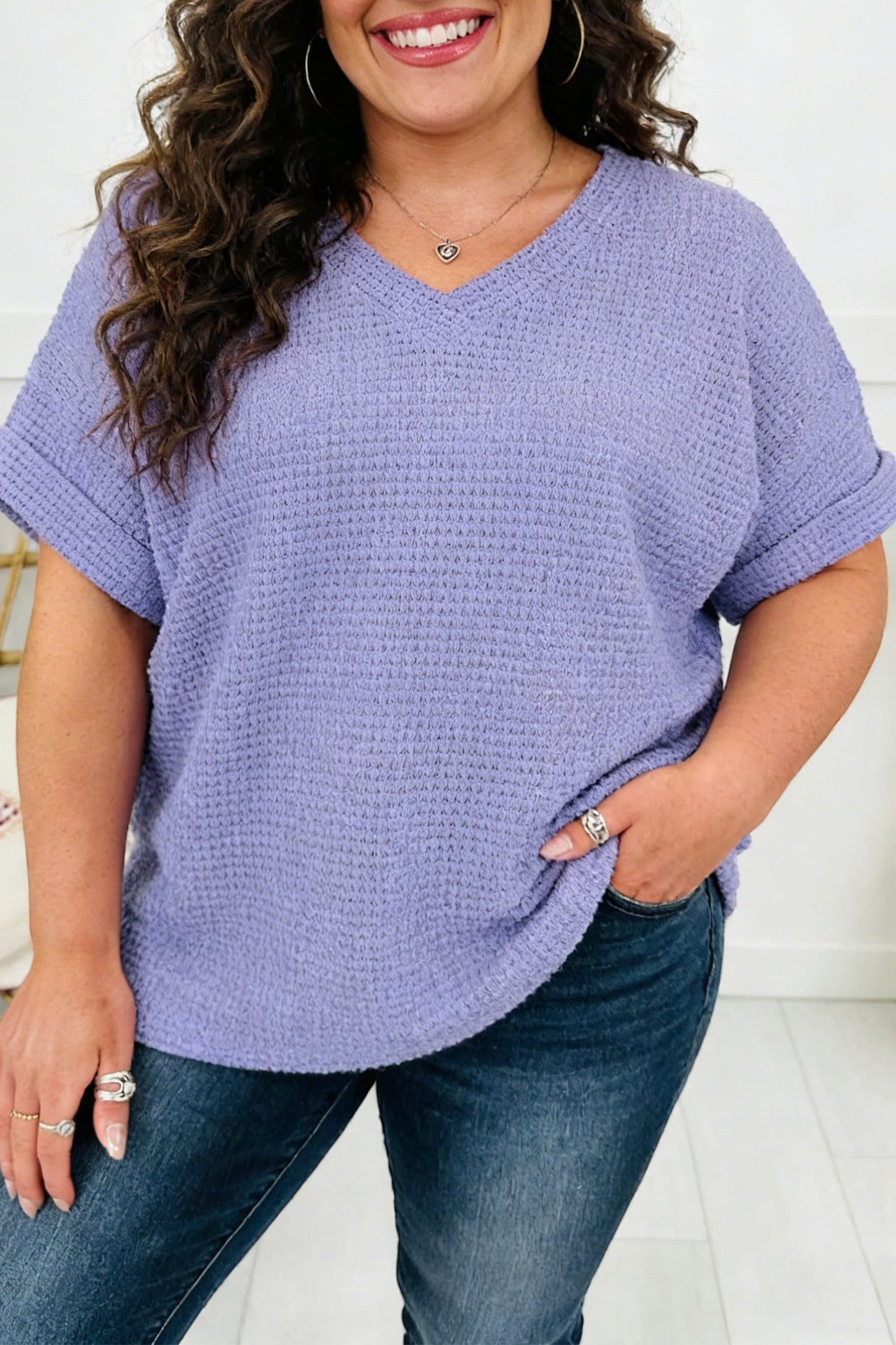Doodlations Coffee Bar & Boutique lavender waffle knit V-neck top with cuffed short sleeves.