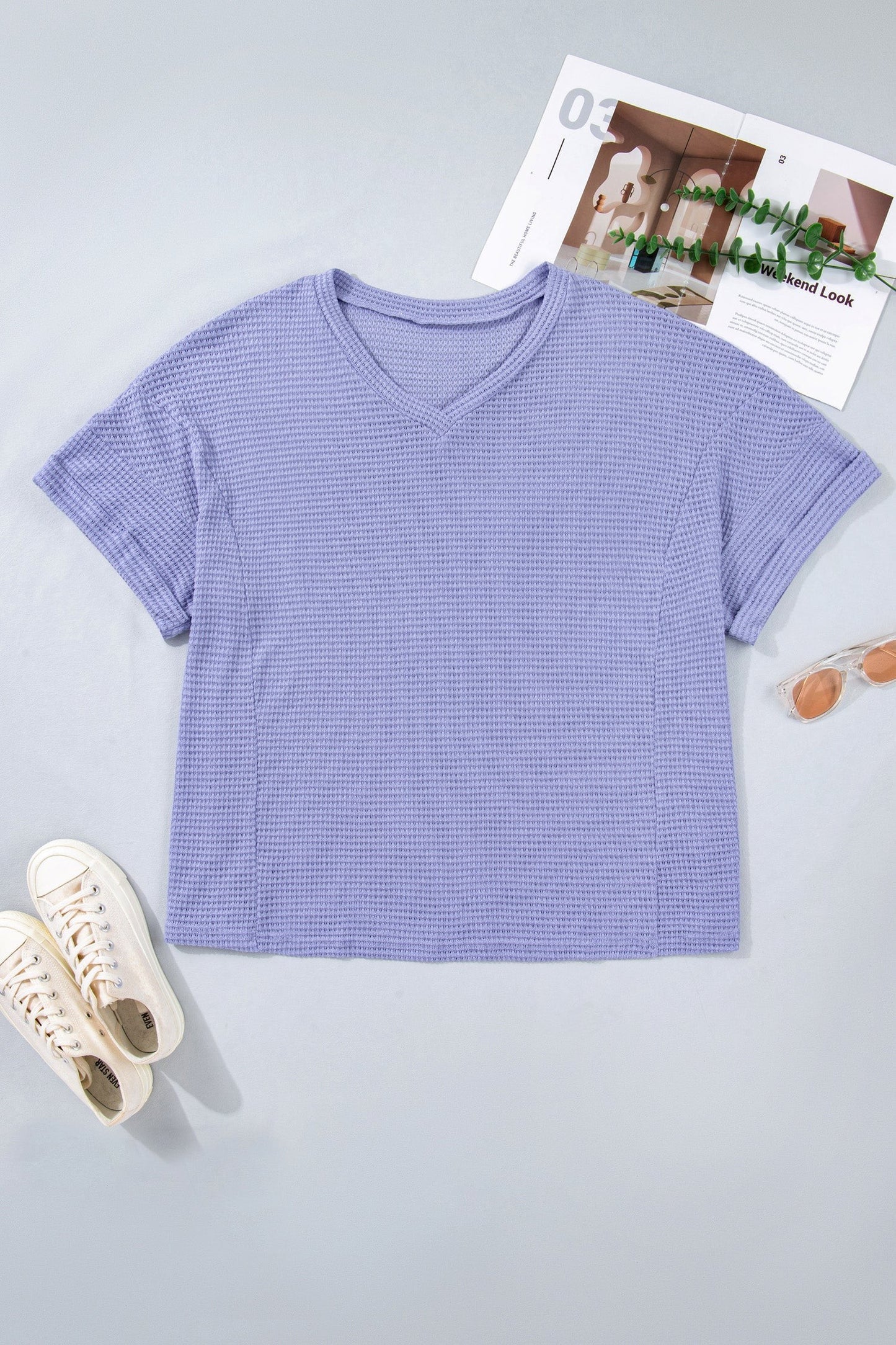 Doodlations Coffee Bar & Boutique lavender waffle knit v-neck short sleeve top with cuffed sleeves.