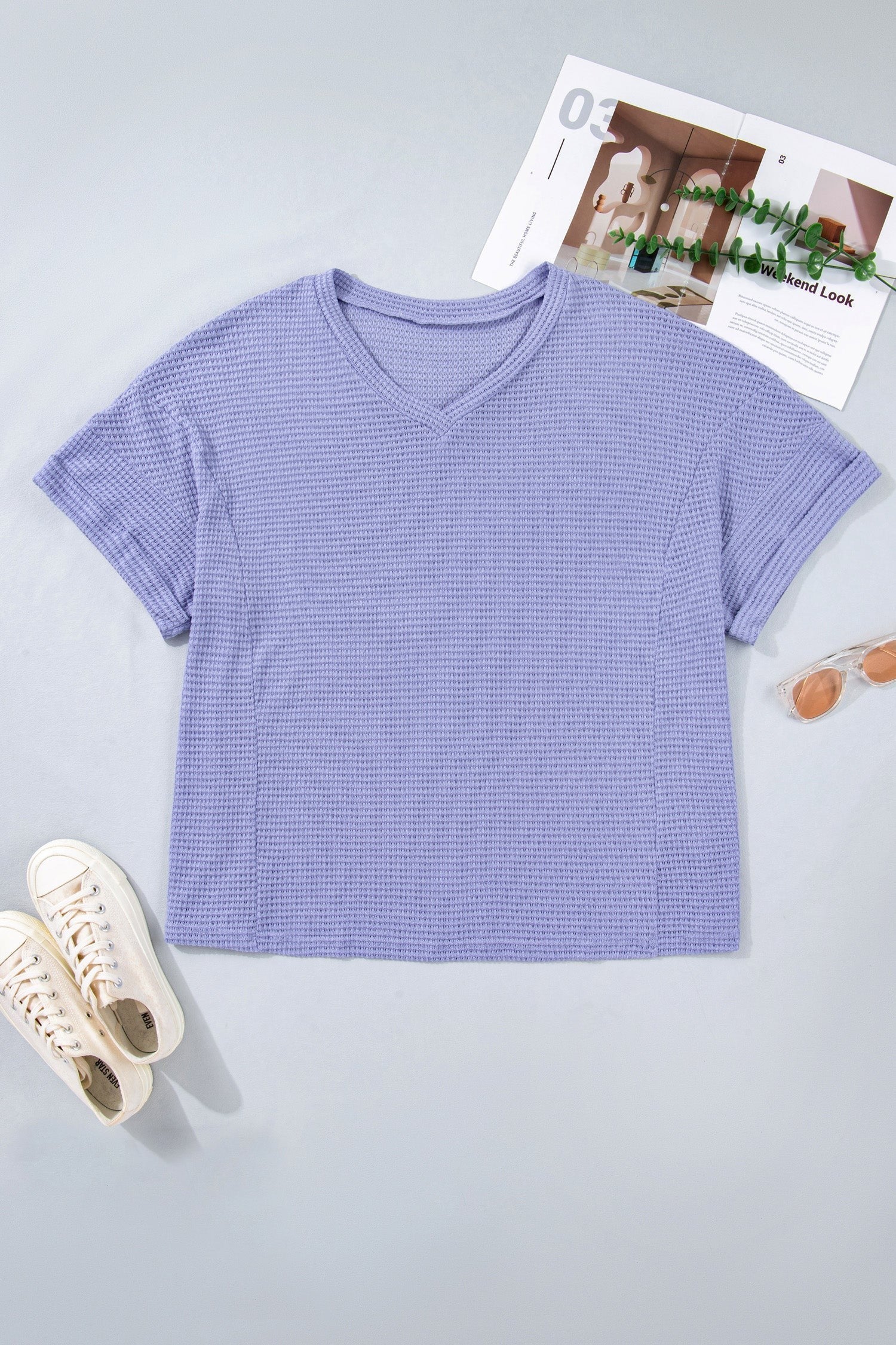 Doodlations Coffee Bar & Boutique lavender waffle knit v-neck short sleeve top with cuffed sleeves.